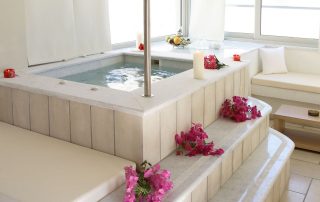 569789c5cca2fdba2af671db-large Antinea Hotel - Junior Suite With Indoor Jacuzzi - Indoor Jacuzzi decorated with Flowers