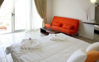 56979035cca2fd72322072f4-large Antinea Hotel - Junior Suite With Private Pool - Bed & couch