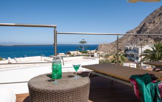 58ac3529ba941bd31a1a7a36-large Antinea Hotel - Junior Suite With Private Pool - Sea View, cocktails and sunbeds